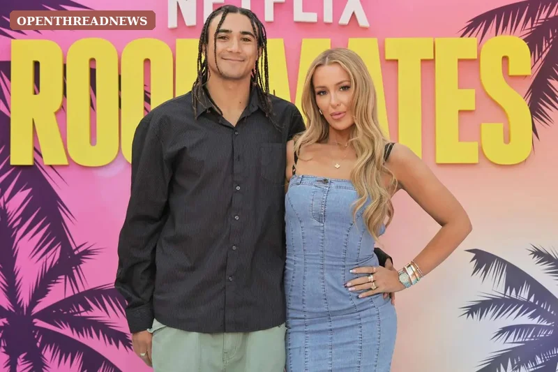 A young couple holding hands on a Las Vegas sidewalk at golden hour with blurred casino lights behind them, for the section on Las Vegas native Tana Mongeau's personal life and relationships.