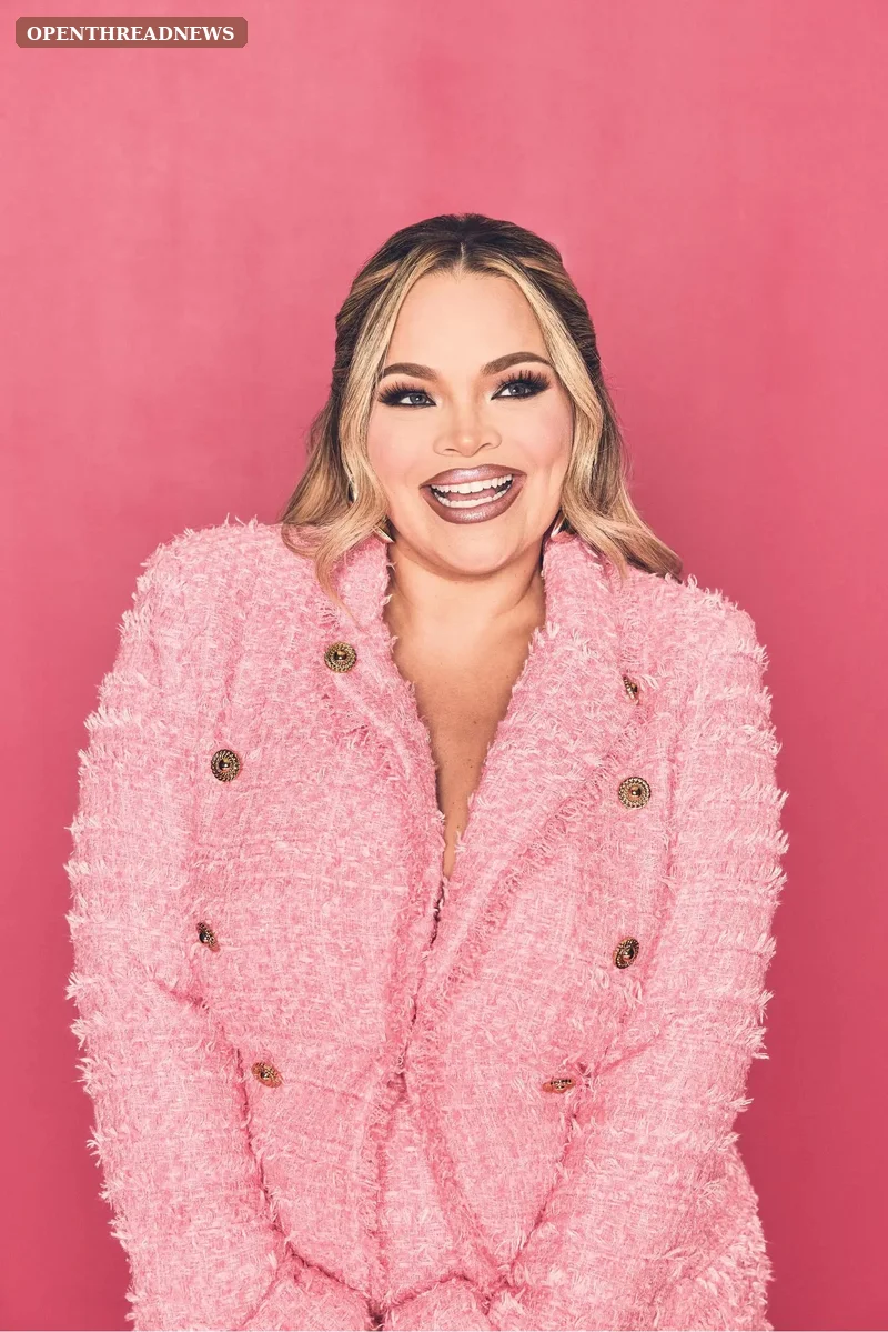 A woman sitting on her kitchen floor at night writing in a notebook by lamplight, for the section on Trisha Paytas's memoir and personal writing