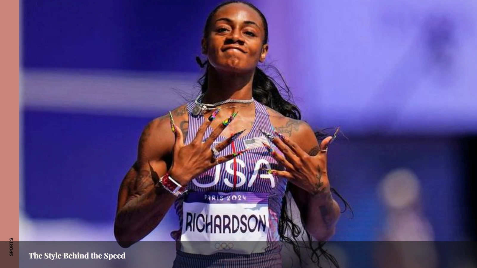 Sha'Carri Richardson showcasing her signature nails, colorful hair, and track style during competition